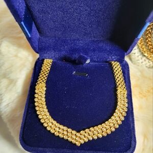 18 K yellow gold diamond necklace.